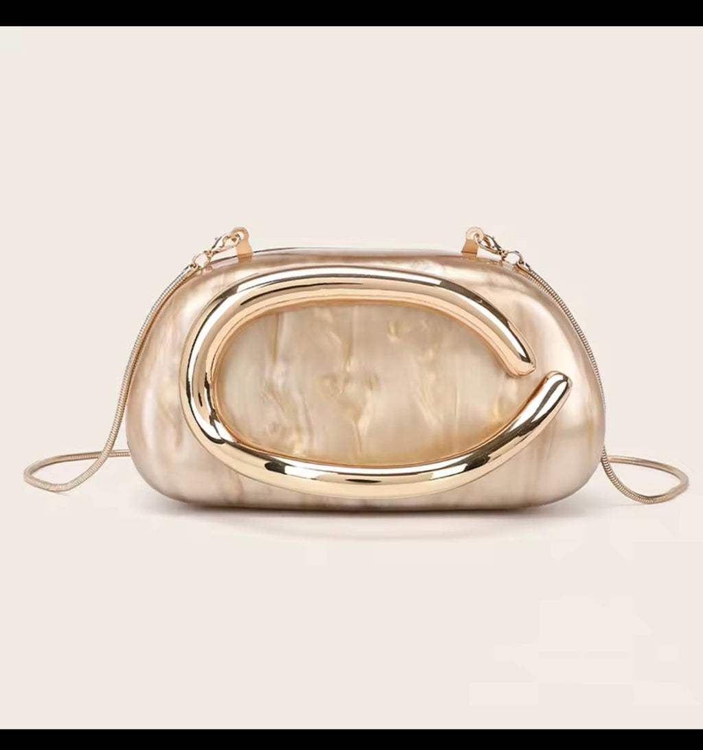 ✨ Sculptural Clutch with Gold handle