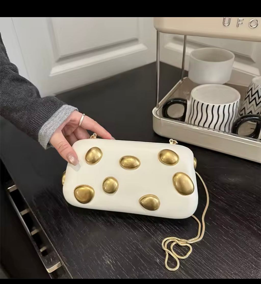 ✨ Gold Pebble Clutch