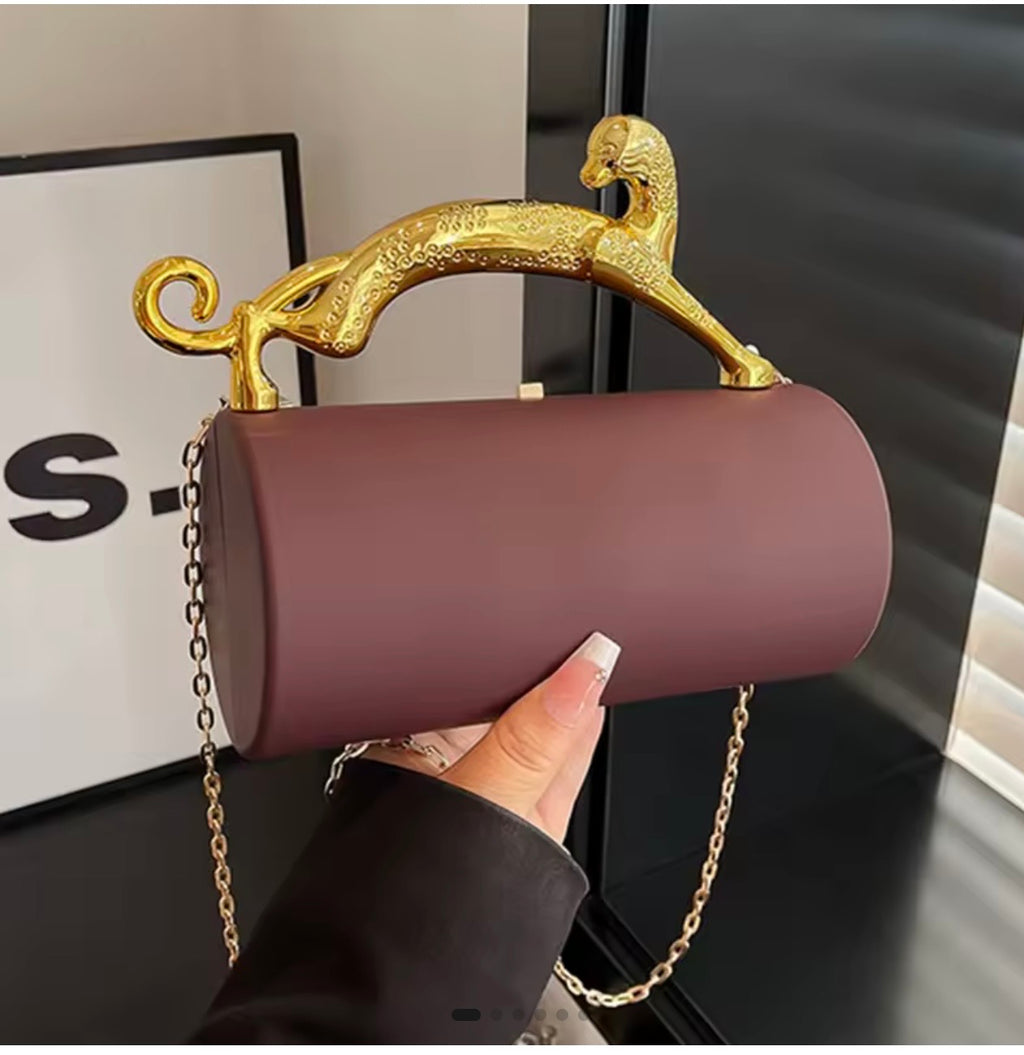Panther Handle Clutch