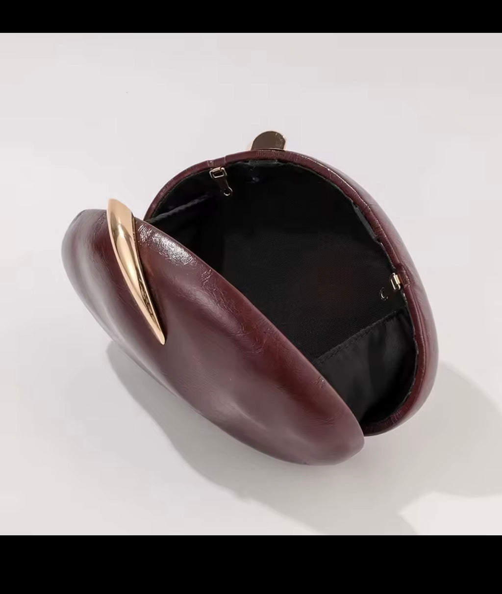 The J‑Luxe Sculptural Clutch