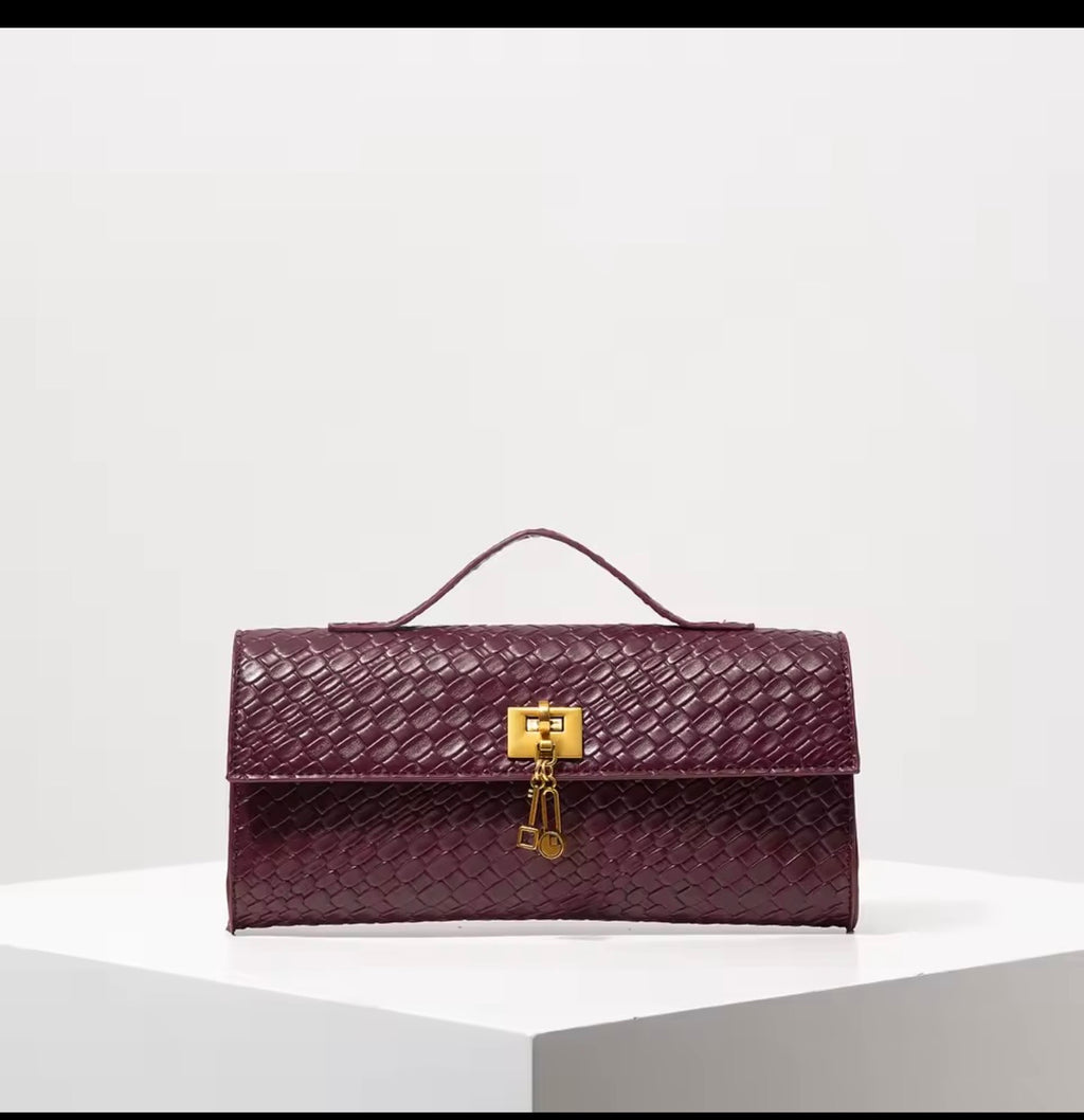 ✨ Blue Woven Lock Clutch