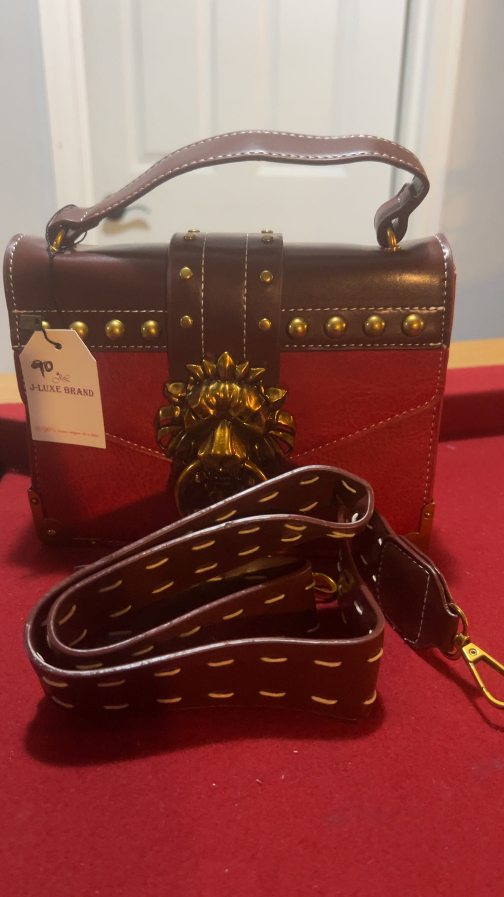 Gold Lion Emblem Handbag
