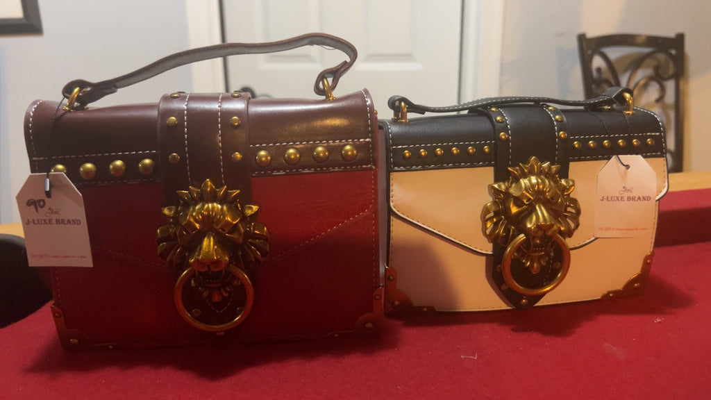 Gold Lion Emblem Handbag