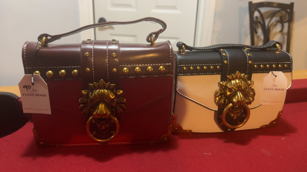 Gold Lion Emblem Handbag