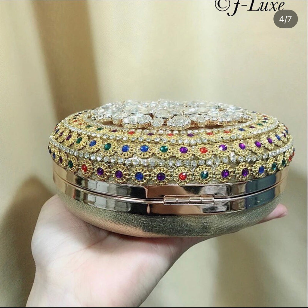 ✨ Radiant Crystal Medallion Clutch