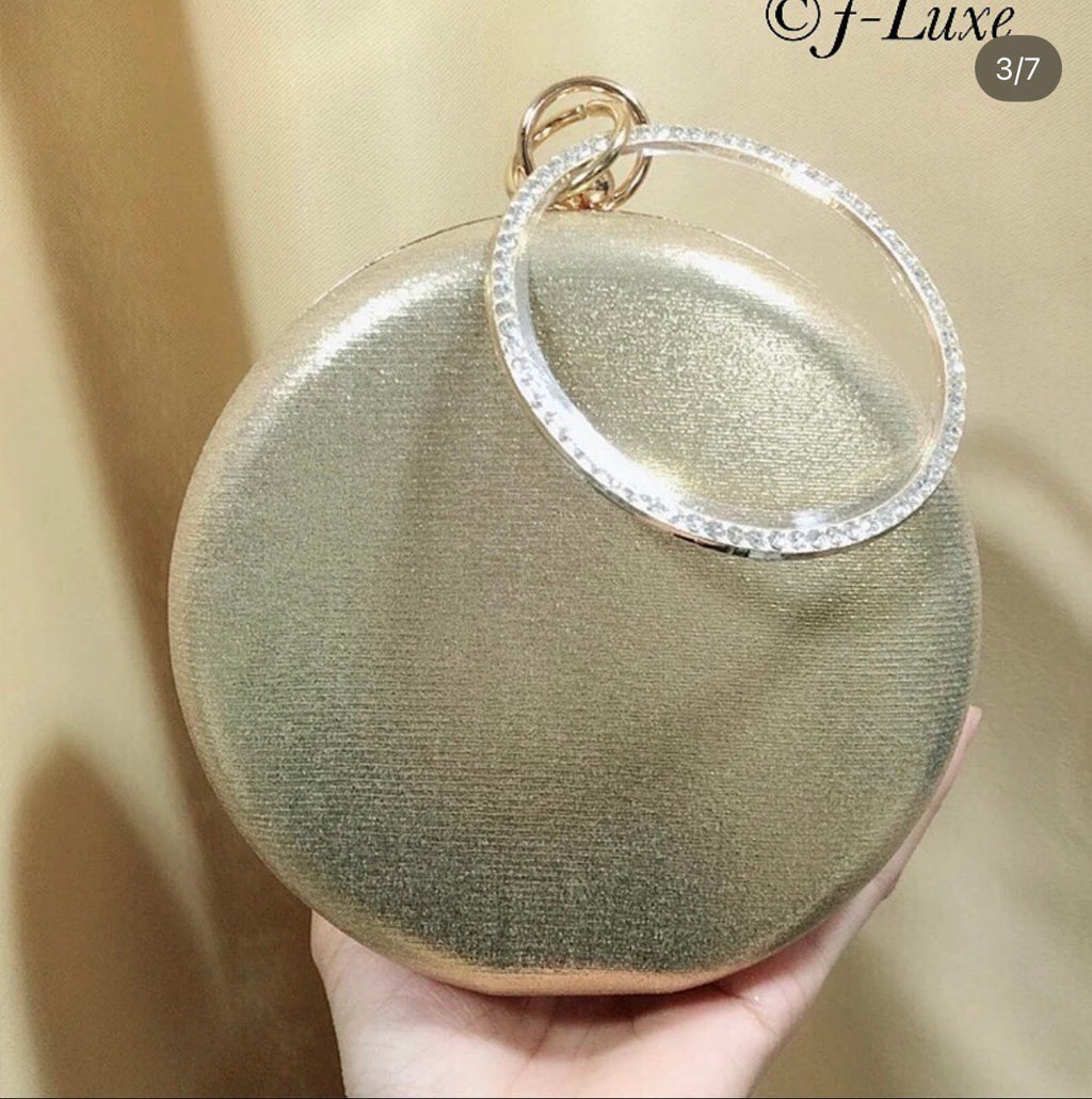 ✨ Radiant Crystal Medallion Clutch