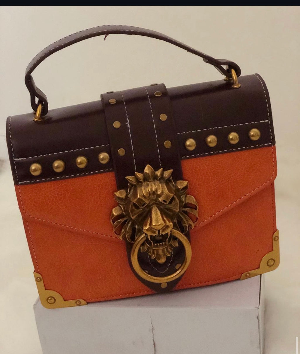 Gold Lion Emblem Handbag