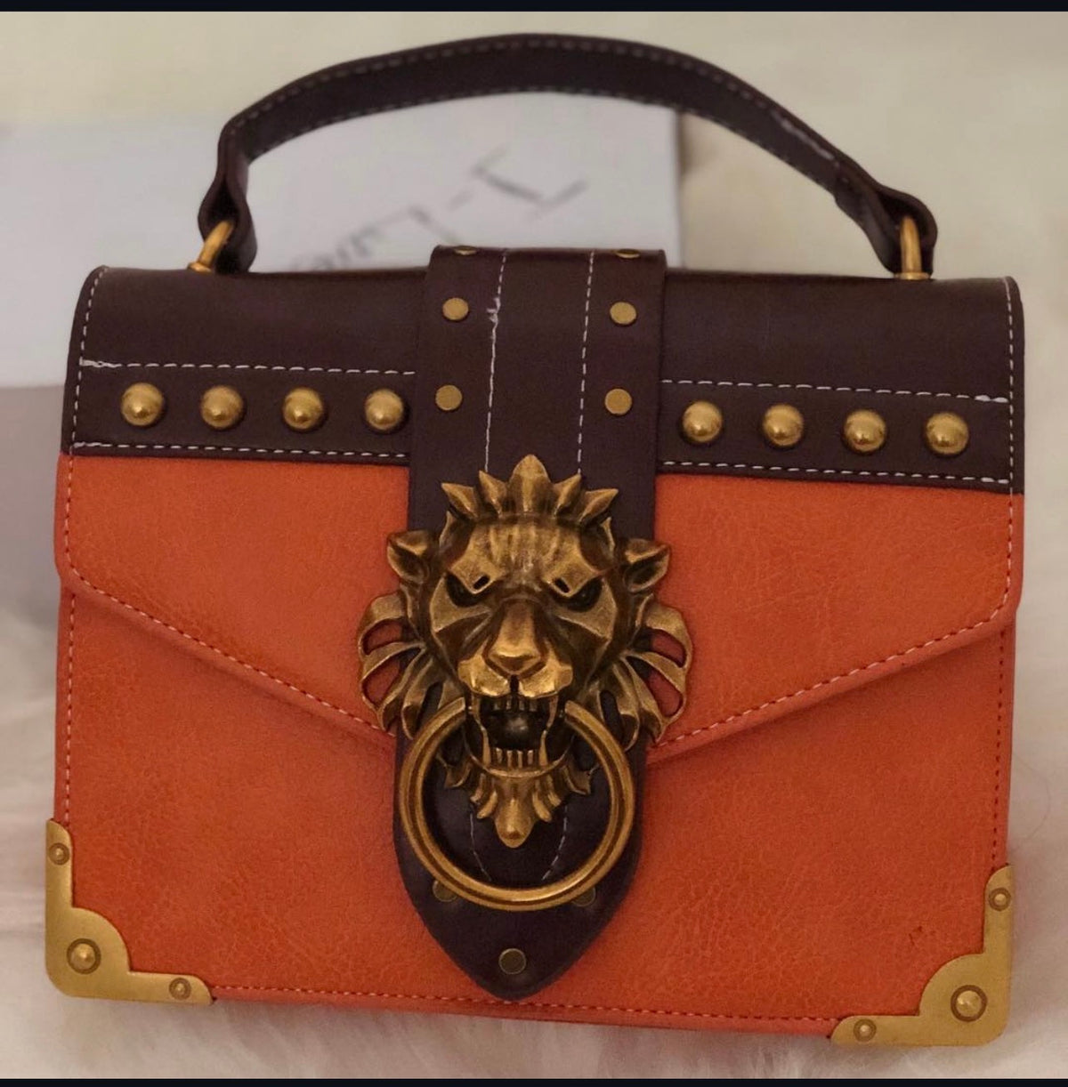 Gold Lion Emblem Handbag