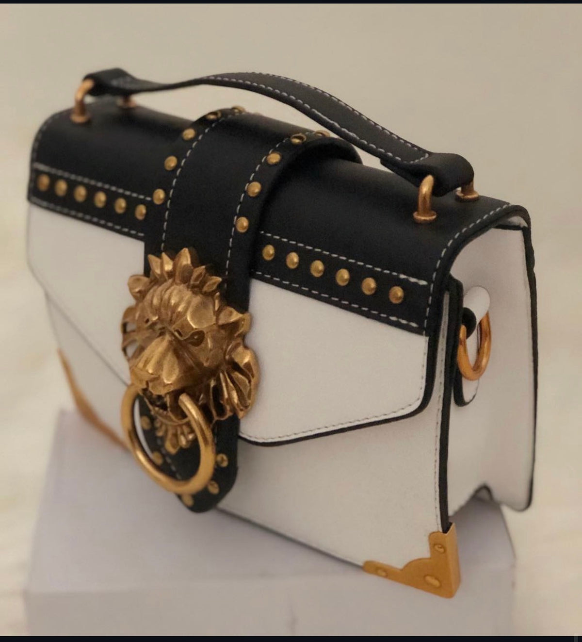 Gold Lion Emblem Handbag