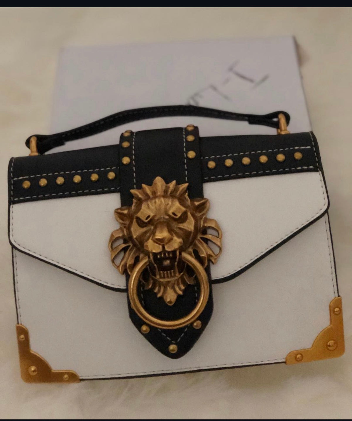 Gold Lion Emblem Handbag